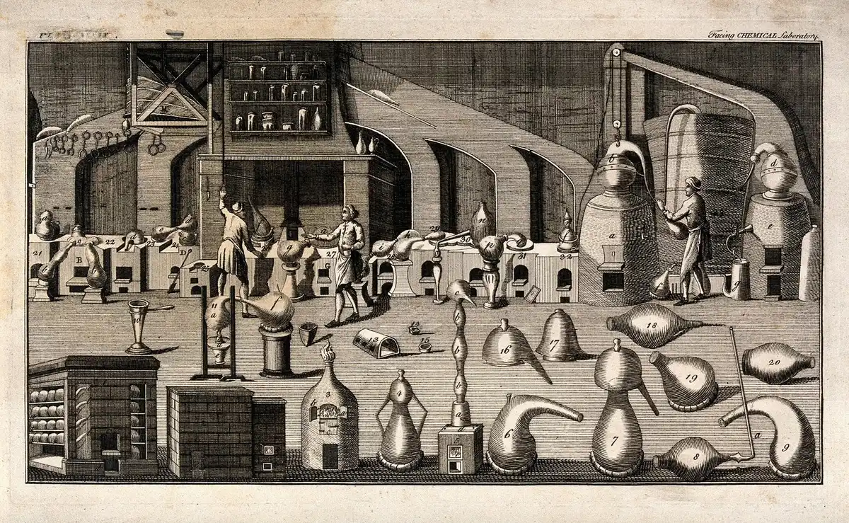 Engraving of an eighteenth-century chemical laboratory, retorts and alembics shelved floor to ceiling.
