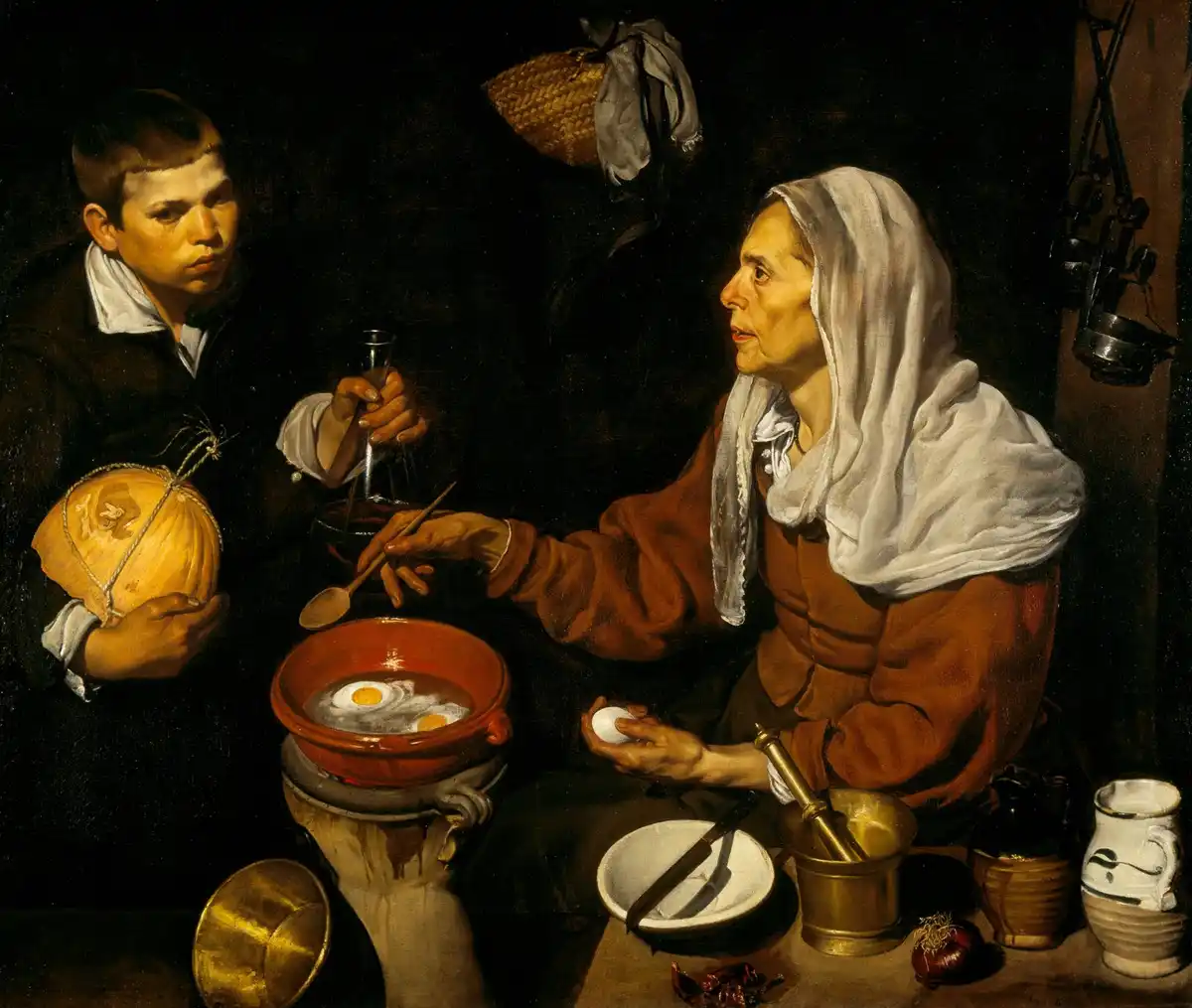 A young boy carrying a melon and a glass flask watches an old woman poach eggs in an earthenware pan of hot oil.
